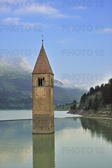 The submerged church tower in Lago di Resia at Curon Venosta