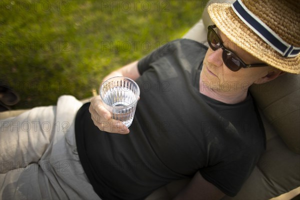 Subject: Relaxation on a lounger in the spring.