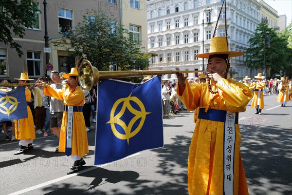 Korean participants entertain the crowd before the start of the Carnival of Cultures in Berlin. The event passed off in glorious sunshine this afternoon as Berlin residents enjoyed the good Whitsun weather