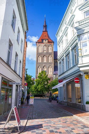 Urban scene in front of the Marienkirche seen from Kroepeliner Strasse