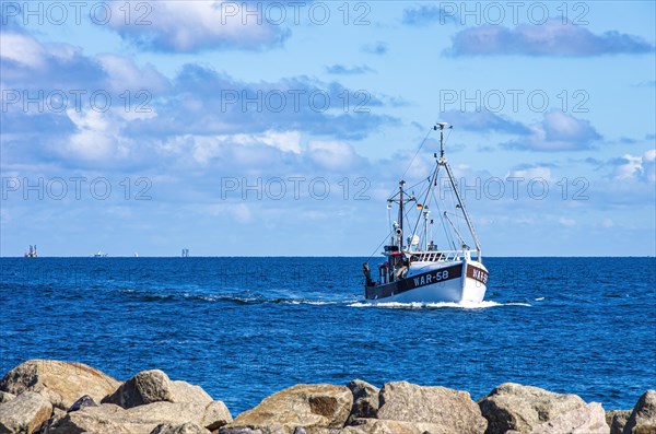 The fishing vessel WAR-58 approaching the harbour entrance