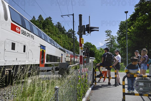 Level crossing SBB passenger train