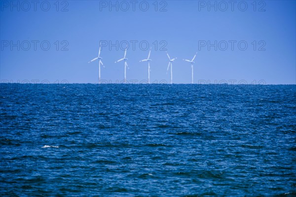 Wind turbines of the offshore wind farm EnBW Baltic 1 stand 16km off the coast of the Fischland-Darâˆšue-Zingst peninsula