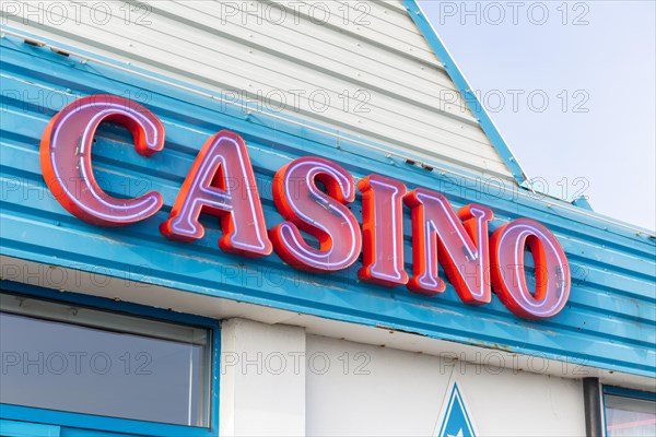 Red sign for casino on seafront
