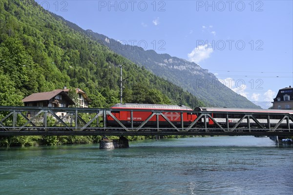 SBB passenger train crossing the Aare