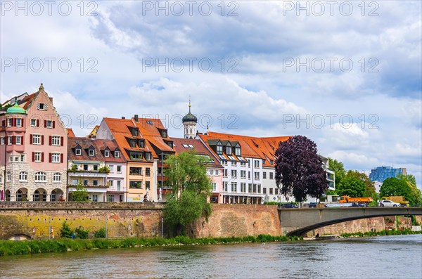 The Danube front with house facades and parts of the historic city wall at the height of the Herdbruecke