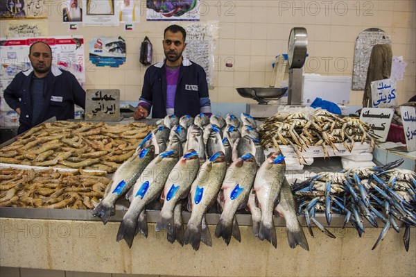 Local fisher man showing his fish