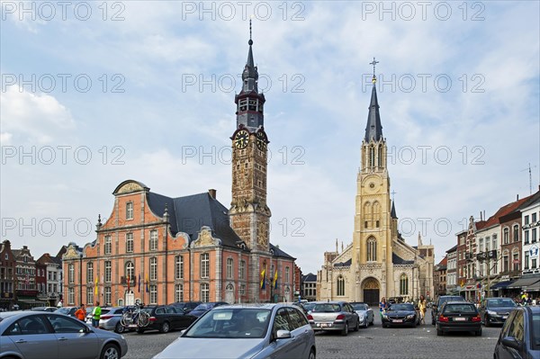 Town hall with belfry and Church of Our Lady