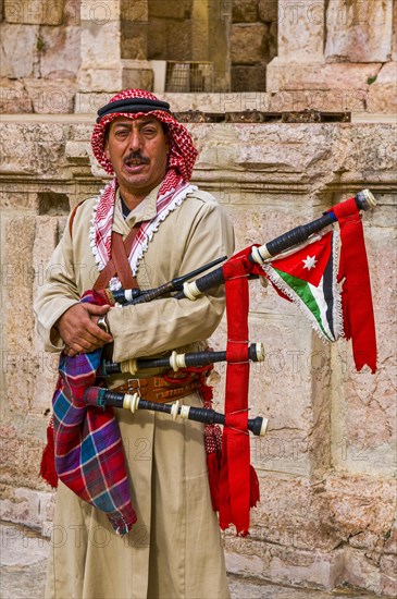 Native man with bagpipe