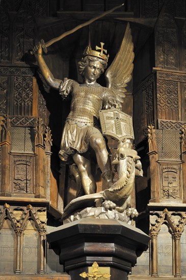 Statue of Archangel Michael slaying a dragon at Mont Saint-Michel