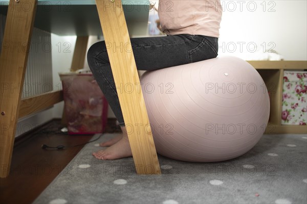 Subject: Girl at a desk