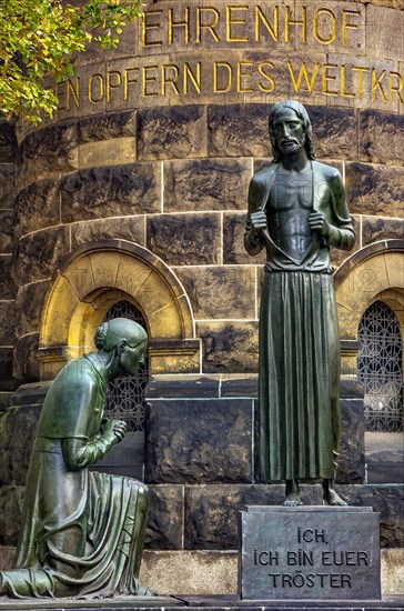 Group sculpture of the consoling Christ by Selmar Werner at the fountain in the courtyard of the Church of Reconciliation in Dresden