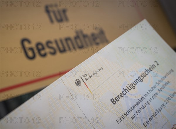 Certificate of entitlement for six FFP2 high protection masks to be collected from a pharmacy. Recorded in front of the Federal Ministry of Health in Berlin