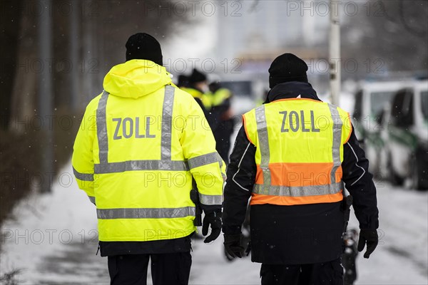 Two customs officers