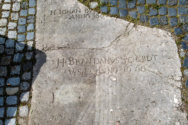 Historic gravestones in the pavement in front of St. Nicholas Church