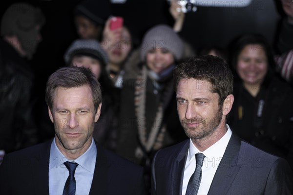 Gerard Butler and Aaron Eckhart attend the European Premiere of Olympus Has Fallen on 03.04.2013 at BFI IMAX
