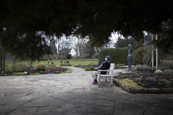 Subject: Pensioner on a park bench in Westfalenpark in Dortmund