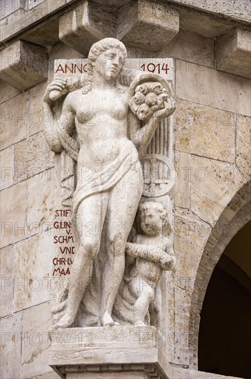 Donated figure from 1914 as ornamental element of the town hall built in reform style