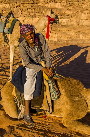 Friendly Bedouin with his camels