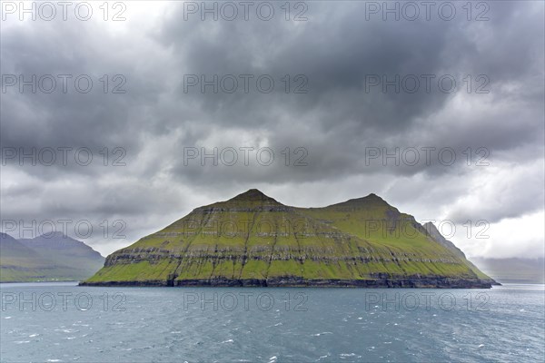 Sea cliffs along the rugged coast of Eysturoy