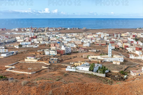 Oblique view over coastal town to Atlantic Ocean