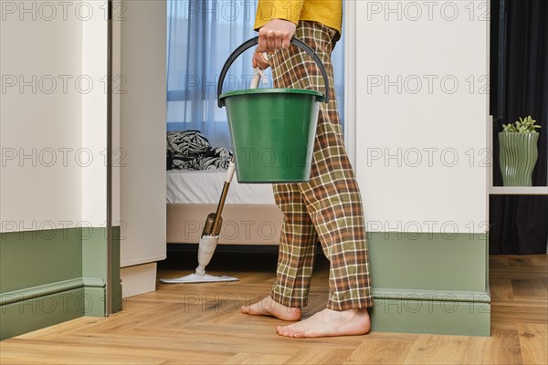 Closeup view of mopping floors in apartmen