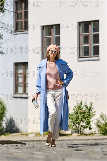 Attractive adult woman in a fashionable