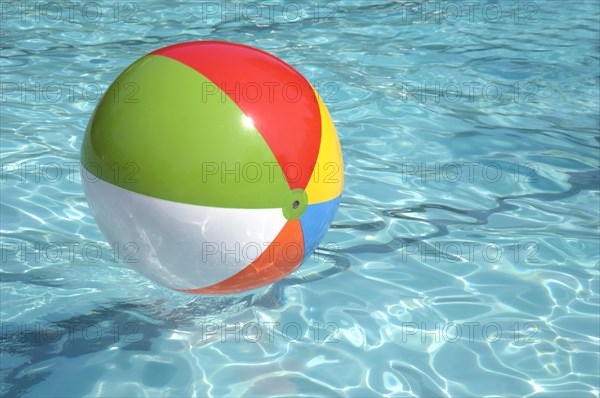 Beach ball in pool