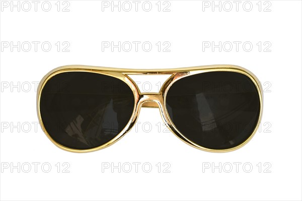 Golden sunglasses on white background