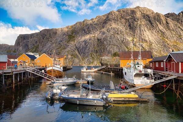 Historic buildings and fishing boats in Nusfjord harbour