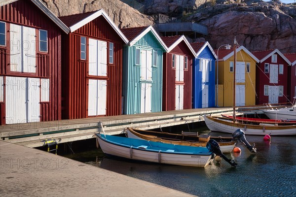 Fishing boats and colourful boathouses in the harbour of Smögen