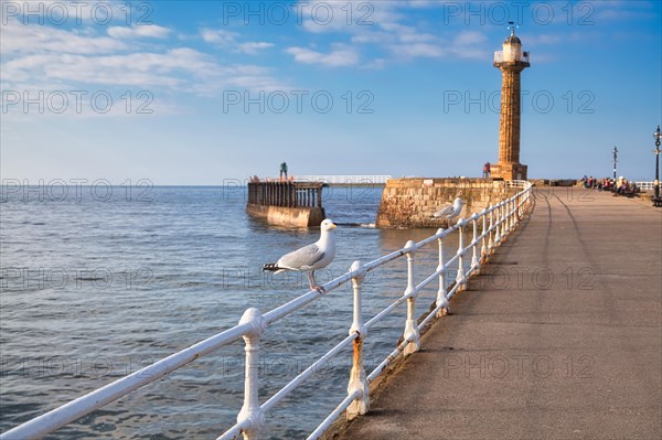 Pier with 19th century stone lighthouse