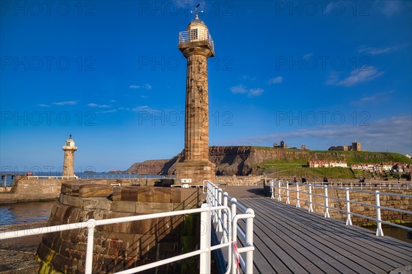 Pier with 19th century stone lighthouse