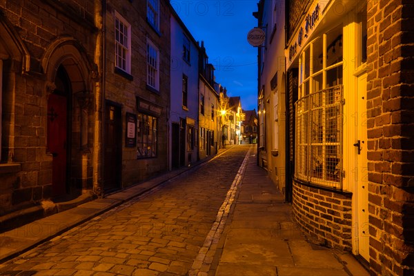 Traditional cobbled street in the historic town centre