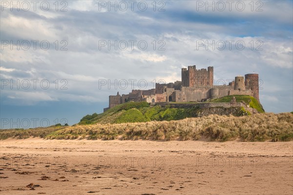 Flat sandy coast with Bamburgh Castle