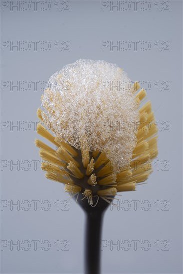 A cleaning brush with foam