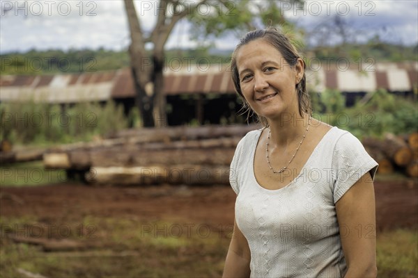 Female worker in lumberyard