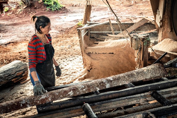 Female worker in work uniform