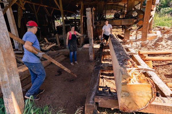 A family that works in a sawmill is a work community united by the passion and commitment to their work