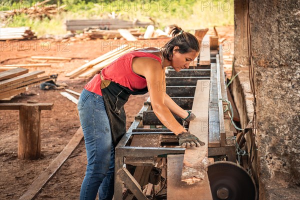 Woman working at the lumberyack