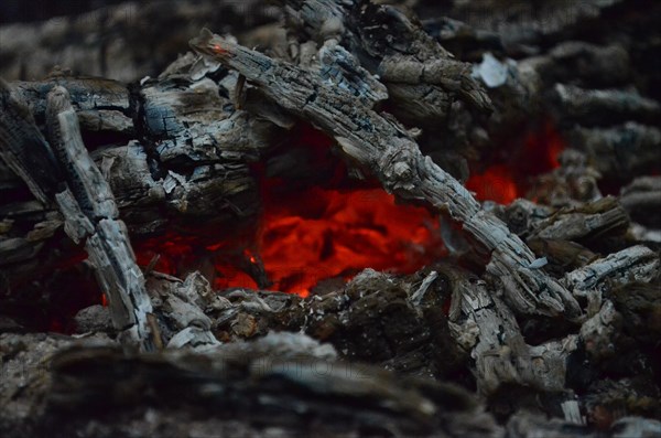 Glowing embers in hot red color