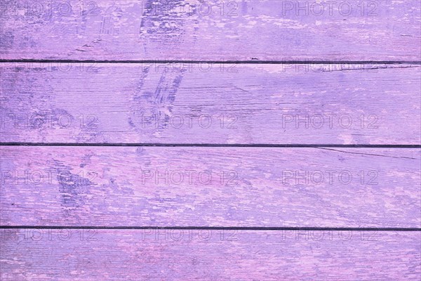 Background with horizontal old wooden planks with chipped paint