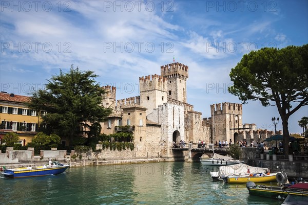 Medieval walls and entrance bridge of Sirmione town