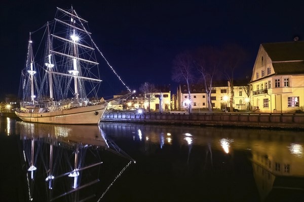 Sailing boat anchored in old town of Klaipeda