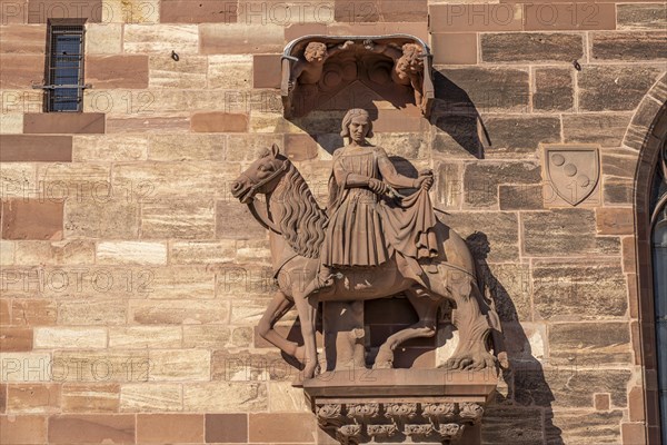 Saint Martin on the façade of Basel Minster in Basel