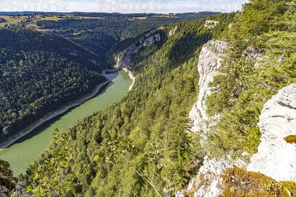 The Doubs reservoir Lac des Moron between Switzerland and France