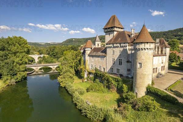 The castle of Cleron and the river Loue seen from the air