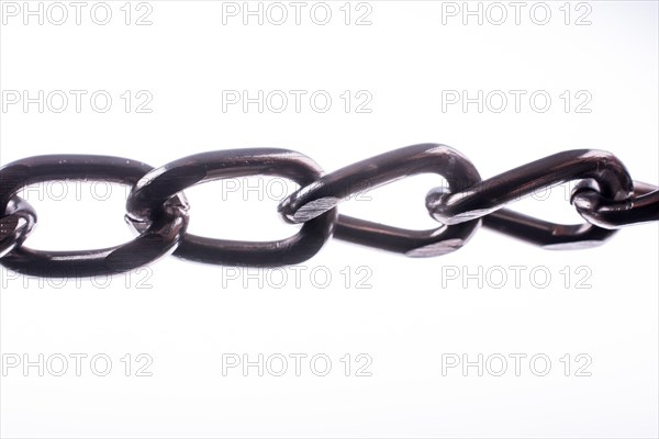 Metal chain on white background