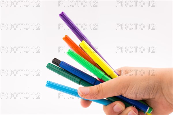 Color felt-tip pens of various color on white background