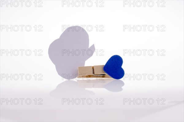 Speech buble clipped with clothespin on a white background